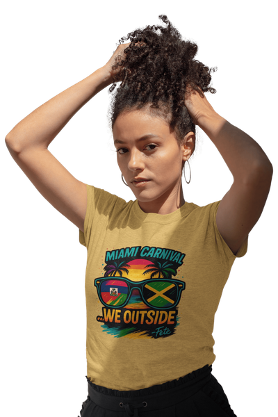 Person wearing a colorful Miami Carnival 2025 t-shirt featuring vibrant tropical artwork, flags, sunglasses, and festive Caribbean-inspired graphics.