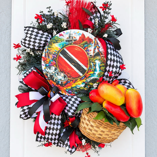 Handmade Trinidad and Tobago Caribbean front door wreath featuring a colorful Trinidad flag centerpiece, red black and white decorative bows, tropical greenery and woven basket filled with artificial peppers.