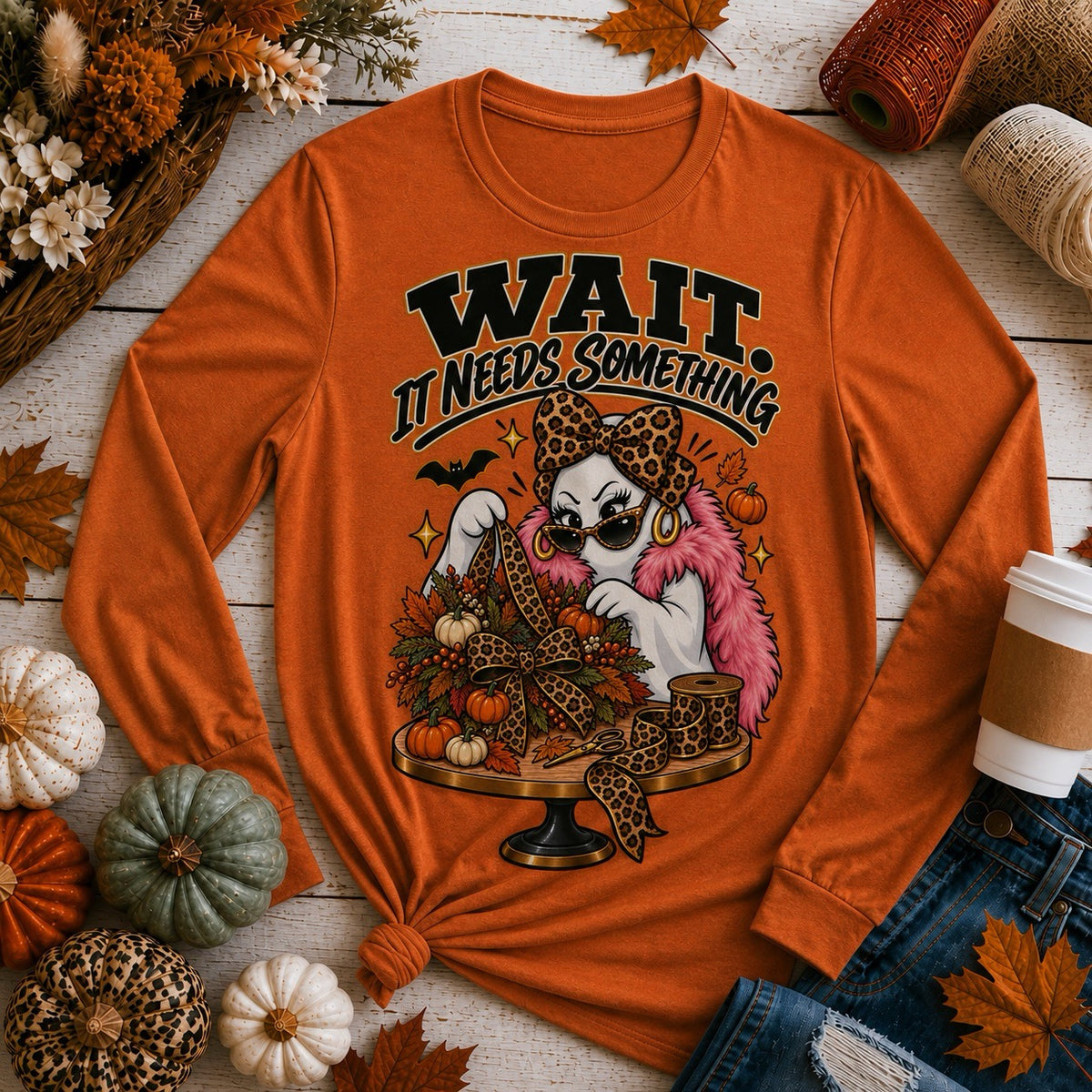 Crafty ghost Halloween-to-fall crossover shirt styled with pumpkins, dried florals, and ribbon spools