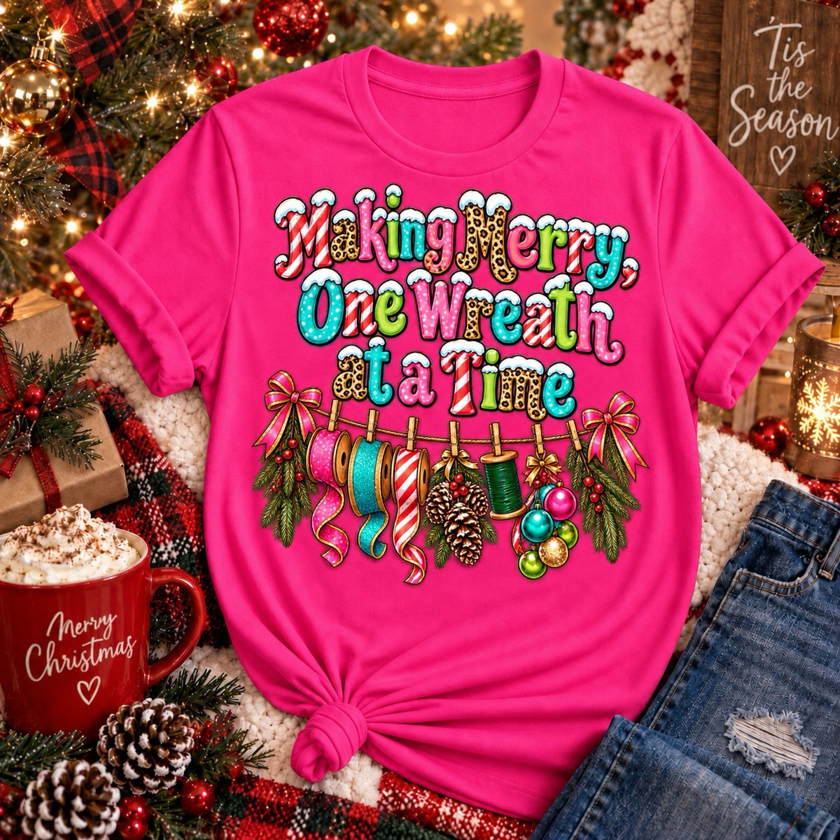 Making Merry One Wreath at a Time hot pink Christmas wreath maker shirt with colorful ribbon and crafting design