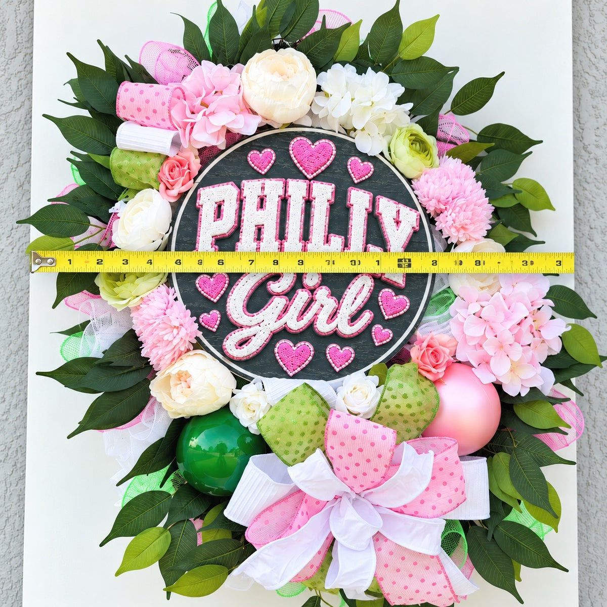 Philadelphia-inspired Philly Girl pink and green floral wreath displayed as colorful front door decor.