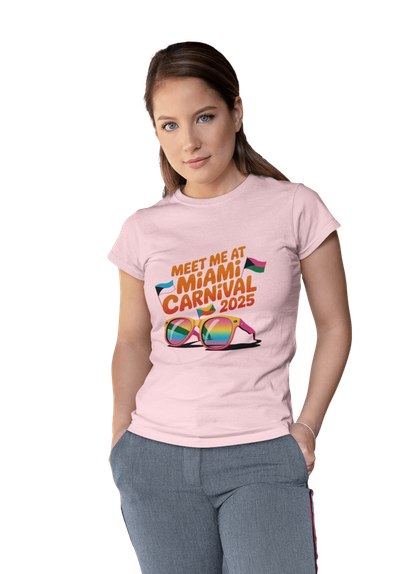 Person wearing a colorful Miami Carnival 2025 t-shirt featuring vibrant tropical artwork, flags, sunglasses, and festive Caribbean-inspired graphics.