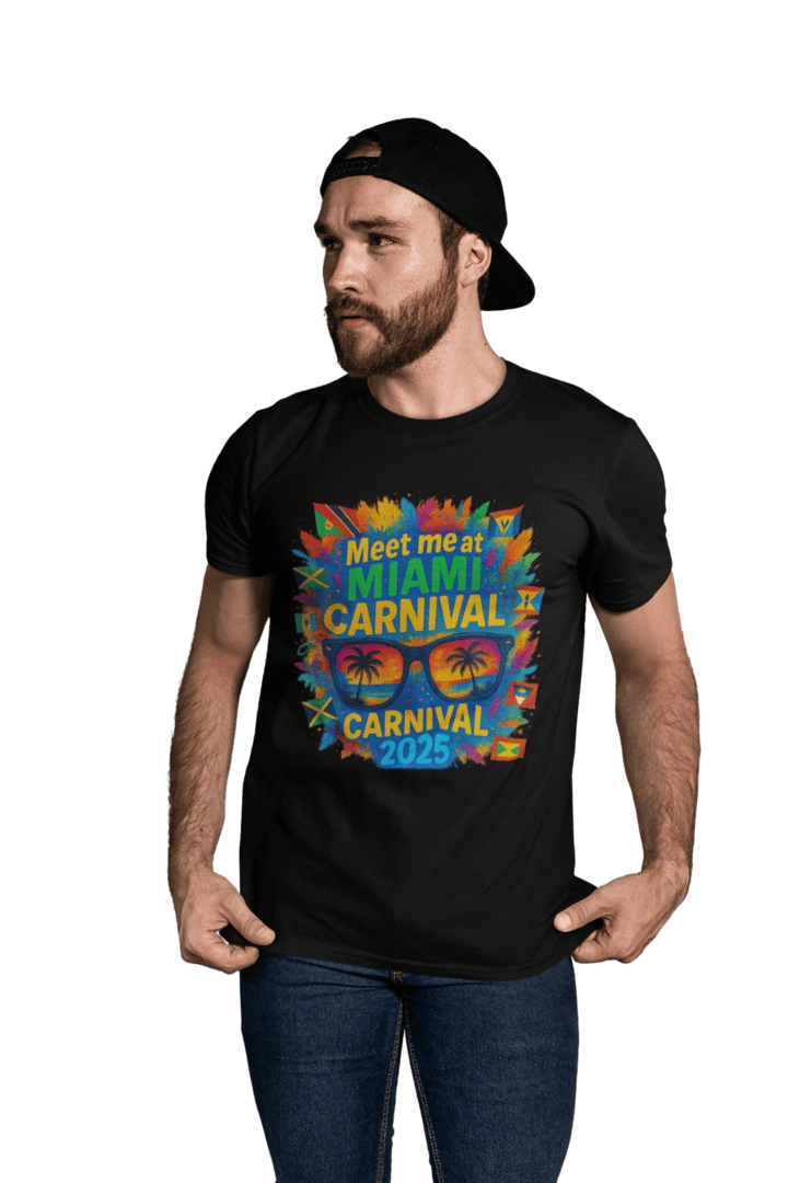 Man wearing a purple t-shirt featuring a vibrant "Meet Me at Miami Carnival 2025" design with colorful feathers, Caribbean flags, and sunglasses reflecting a tropical sunset scene.