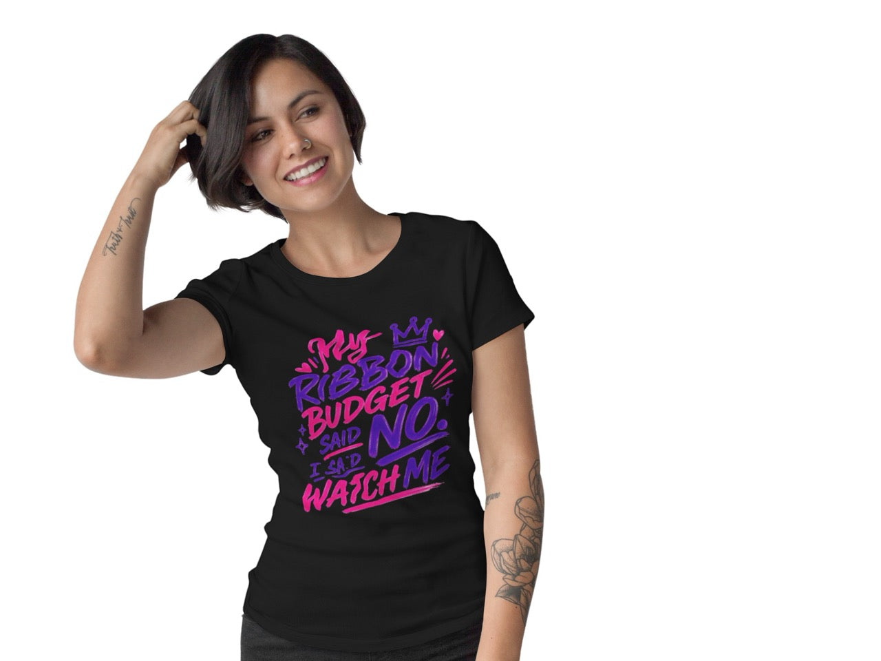 Woman wearing a t-shirt featuring the phrase “My Ribbon Budget Said No, I Said Watch Me” in bold, playful lettering designed for wreath makers, crafters, and ribbon enthusiasts.