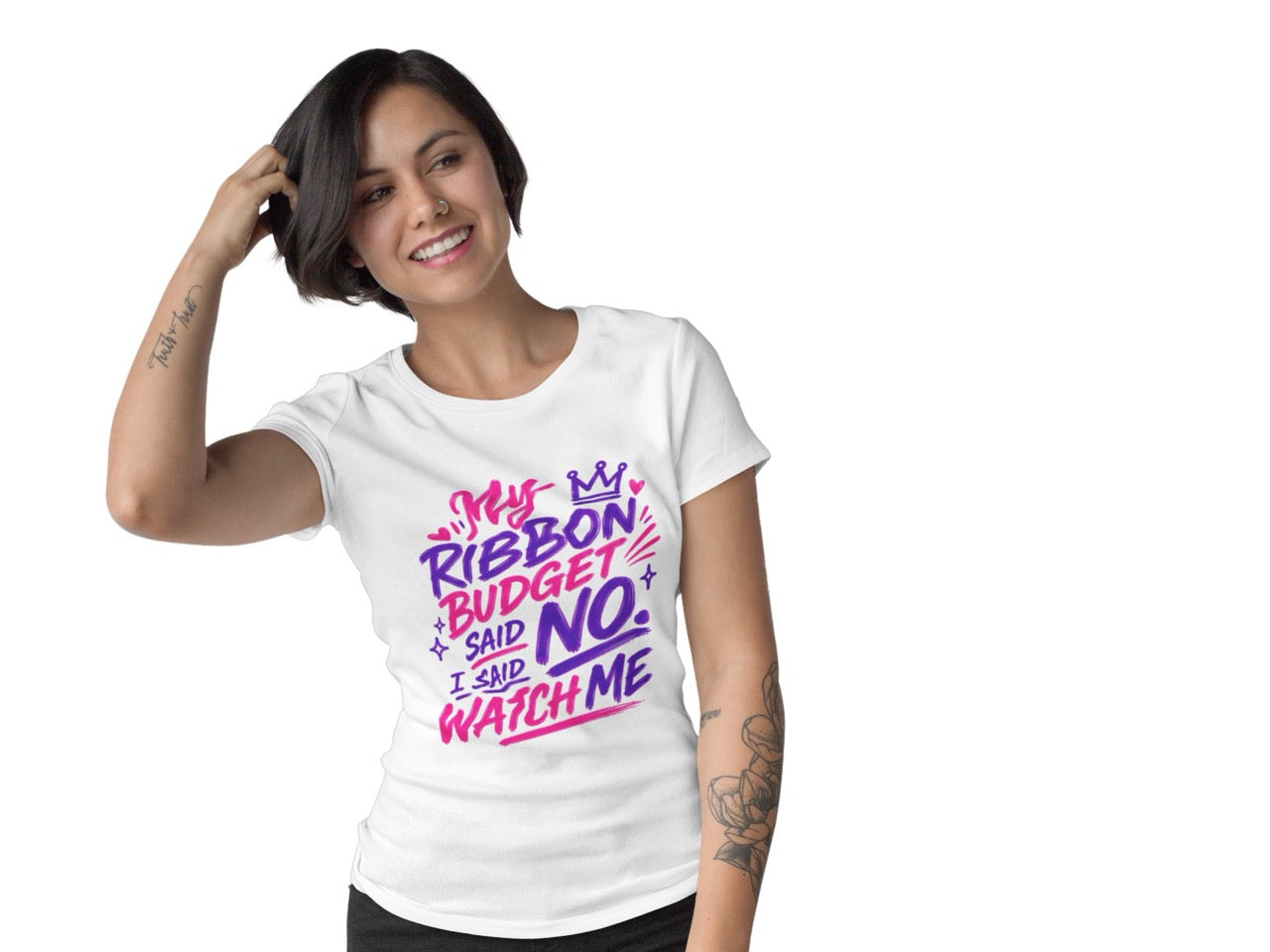 Woman wearing a t-shirt featuring the phrase “My Ribbon Budget Said No, I Said Watch Me” in bold, playful lettering designed for wreath makers, crafters, and ribbon enthusiasts.