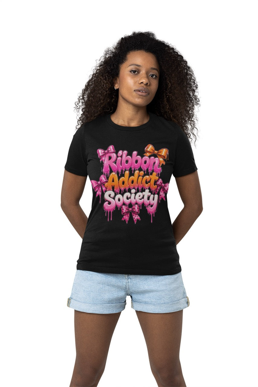 Ribbon Addict Society t-shirt featuring bold decorative lettering with bow accents and a fun crafting-themed graphic design for wreath makers and ribbon enthusiasts.