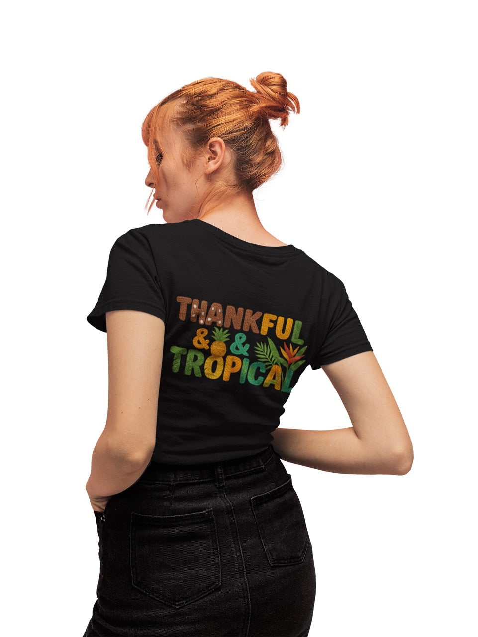 A bright and cheerful Caribbean-inspired design featuring the phrase “Thankful & Tropical.” The letters are textured to resemble soft, woven yarn in warm shades of brown, orange, green, and teal. Tropical elements like a pineapple, palm leaves, and a bird of paradise flower are integrated into the design, symbolizing warmth, gratitude, and island life. The background transitions smoothly from green to golden hues, evoking a tropical sunset glow.