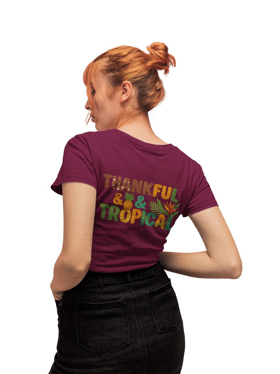 A bright and cheerful Caribbean-inspired design featuring the phrase “Thankful & Tropical.” The letters are textured to resemble soft, woven yarn in warm shades of brown, orange, green, and teal. Tropical elements like a pineapple, palm leaves, and a bird of paradise flower are integrated into the design, symbolizing warmth, gratitude, and island life. The background transitions smoothly from green to golden hues, evoking a tropical sunset glow.