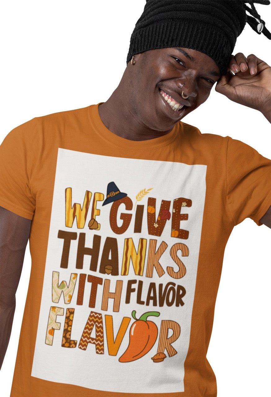 A lively and playful Thanksgiving design featuring the phrase “We Give Thanks with Flavor.” Each letter is styled with warm autumn patterns including pumpkins, leaves, zigzags, stripes, and florals in shades of brown, orange, and gold. The design includes a pilgrim hat, acorns, a chili pepper, and a mini pie, blending classic Thanksgiving imagery with a fun Caribbean-inspired twist that celebrates culture and spice.