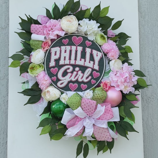 Philadelphia-inspired Philly Girl pink and green floral wreath displayed as colorful front door decor.
