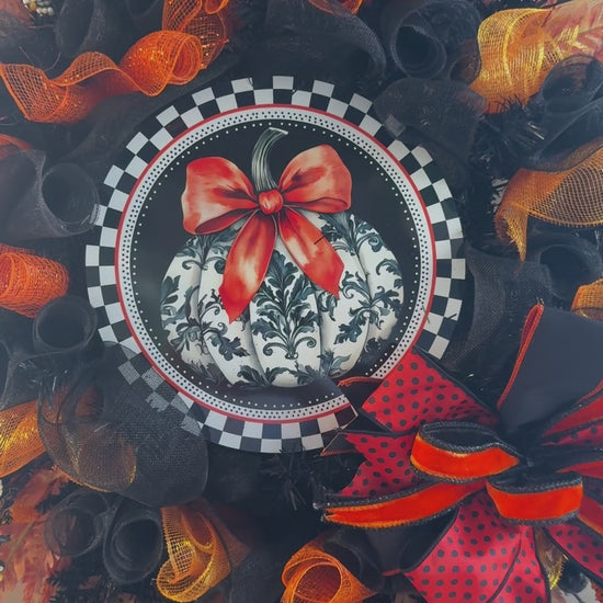 Luxury Halloween wreath with orange bow black mesh and fall foliage